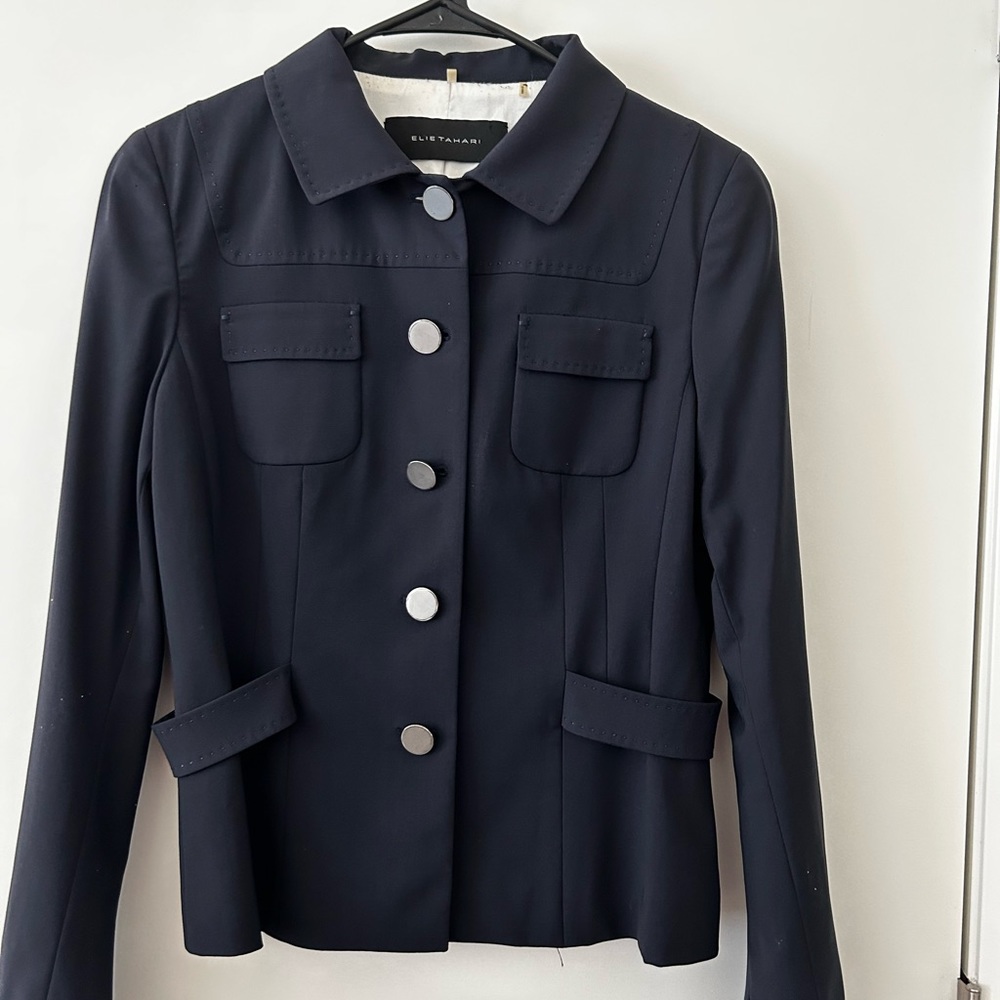 Two piece suit. Dry cleaned ready to wear